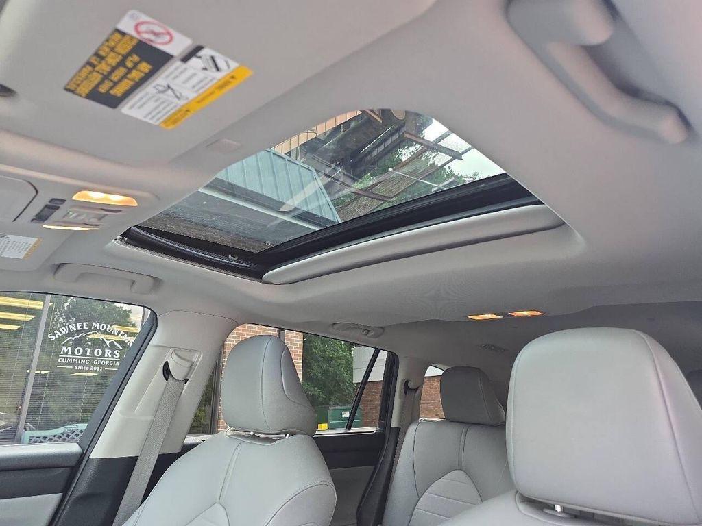 used 2021 Toyota Highlander car, priced at $26,997