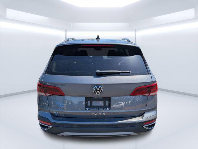 used 2023 Volkswagen Taos car, priced at $16,501