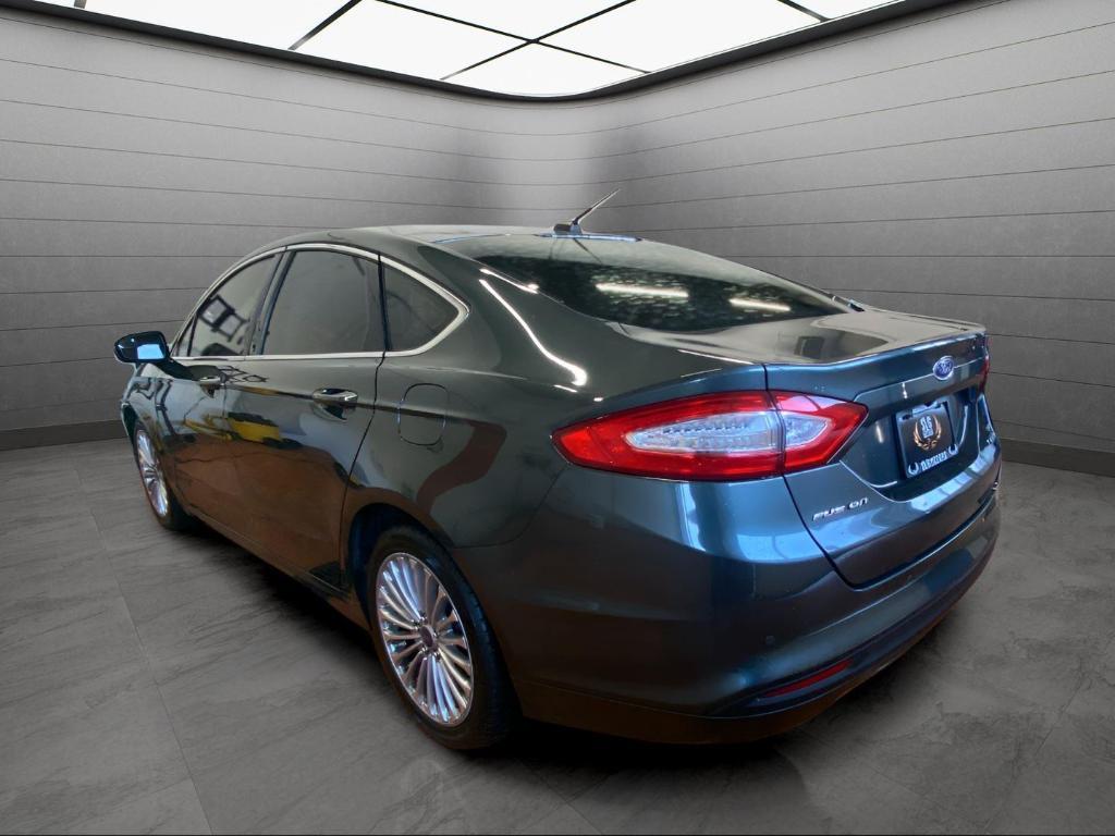 used 2016 Ford Fusion car, priced at $9,500