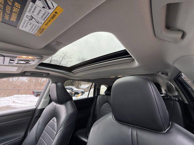 used 2021 Toyota Highlander Hybrid car, priced at $34,299