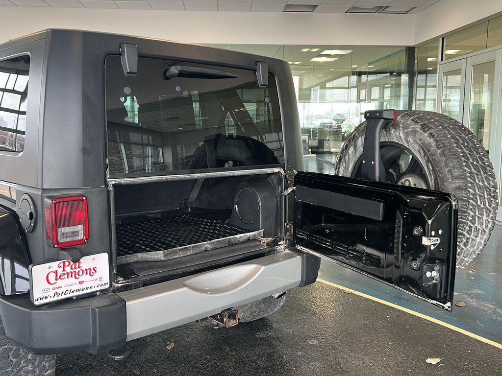 used 2010 Jeep Wrangler Unlimited car, priced at $13,990