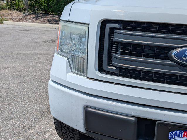 used 2014 Ford F-150 car, priced at $11,500