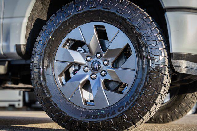 new 2025 Ford F-150 Lightning car, priced at $79,707