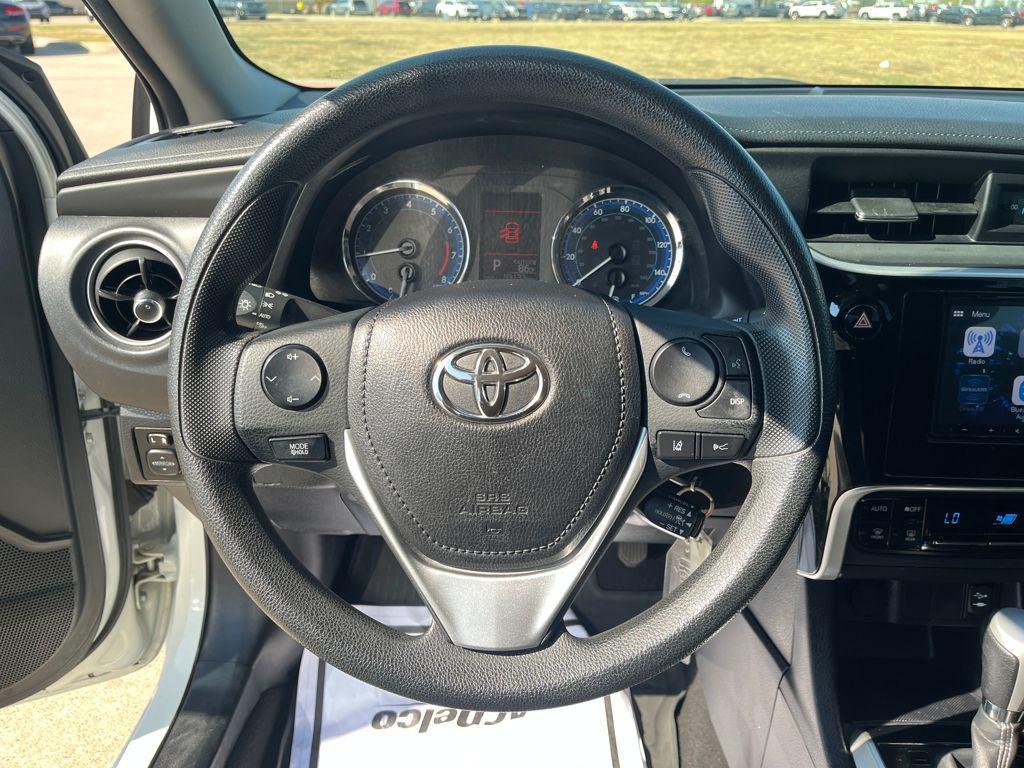 2017 Super White Toyota Corolla