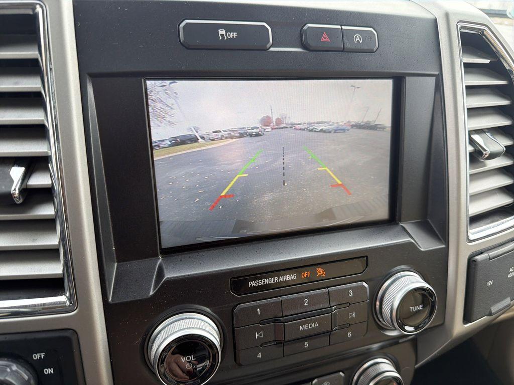 used 2015 Ford F-150 car, priced at $14,000