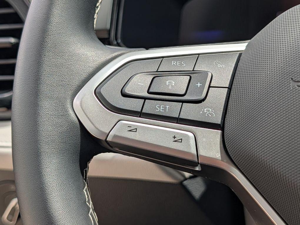 used 2025 Volkswagen Taos car, priced at $23,491