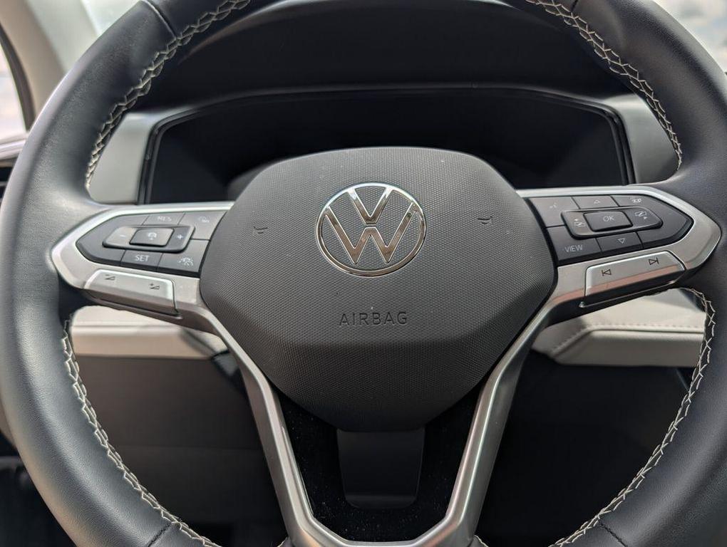 used 2025 Volkswagen Taos car, priced at $23,491
