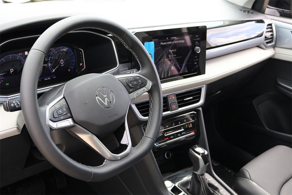 new 2025 Volkswagen Taos car, priced at $30,303