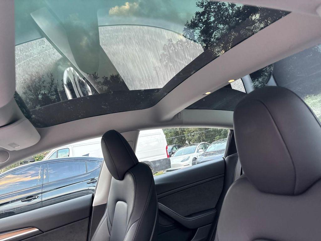 used 2023 Tesla Model 3 car, priced at $23,599