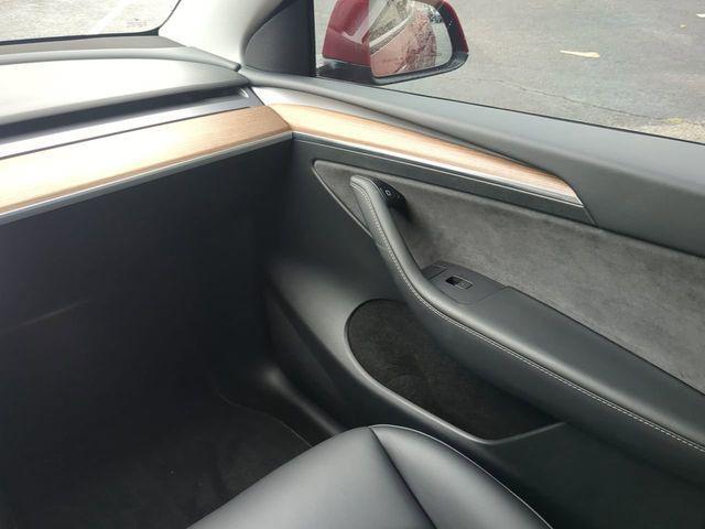 used 2023 Tesla Model Y car, priced at $33,084