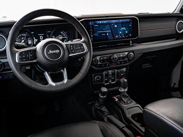 used 2024 Jeep Wrangler car, priced at $33,998