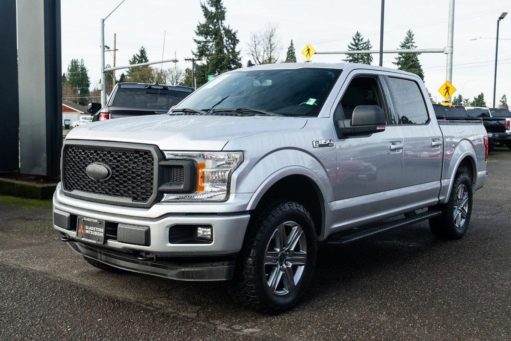 used 2019 Ford F-150 car, priced at $33,627
