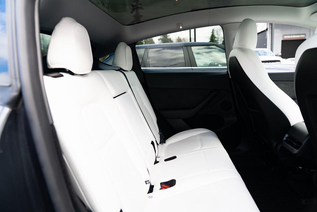 used 2025 Tesla Model Y car, priced at $38,154