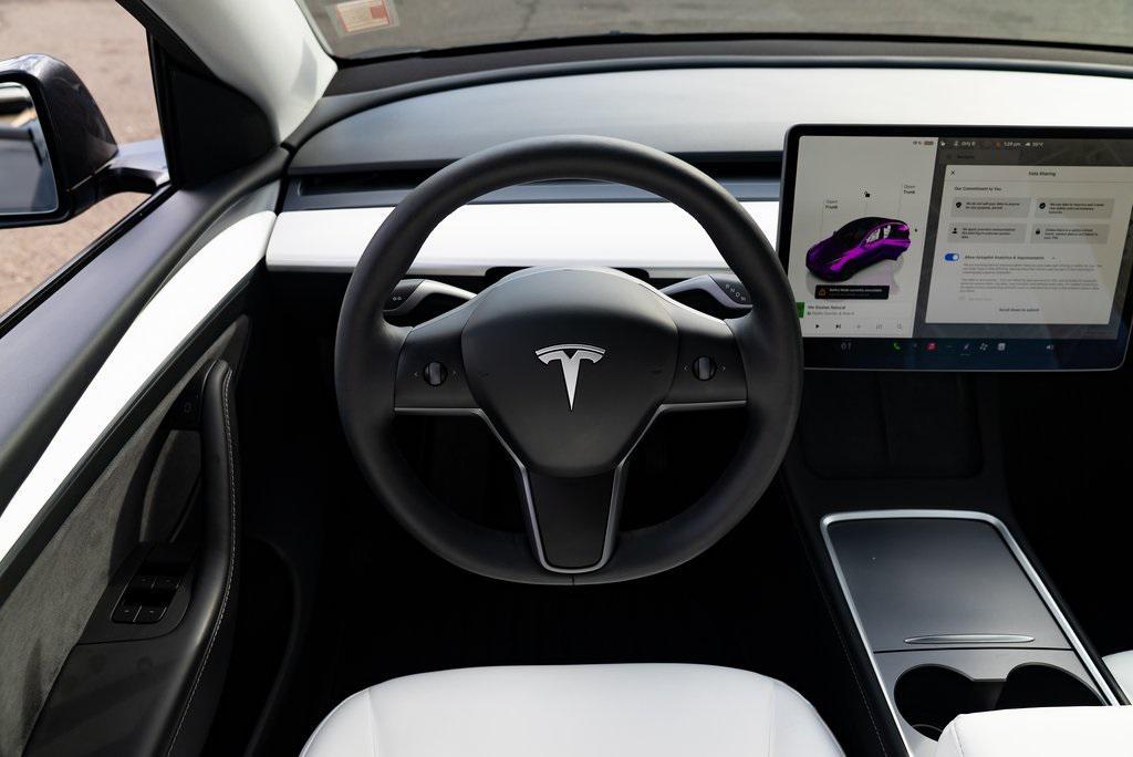 used 2025 Tesla Model Y car, priced at $38,154