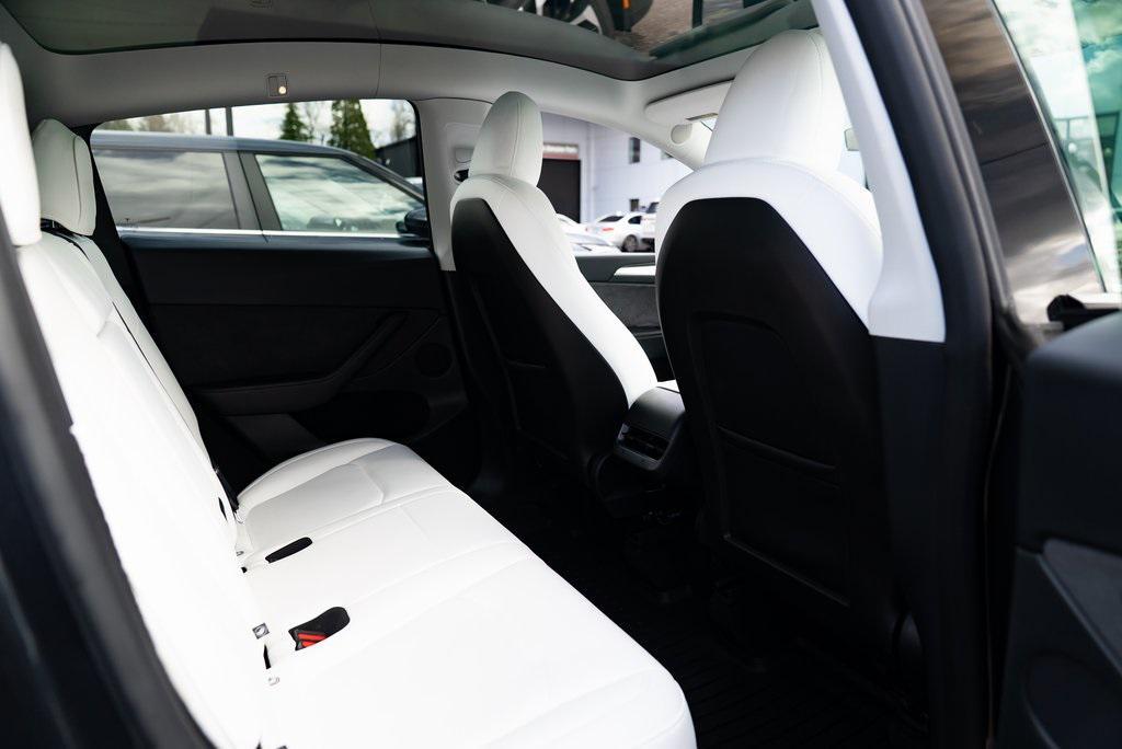 used 2025 Tesla Model Y car, priced at $38,154