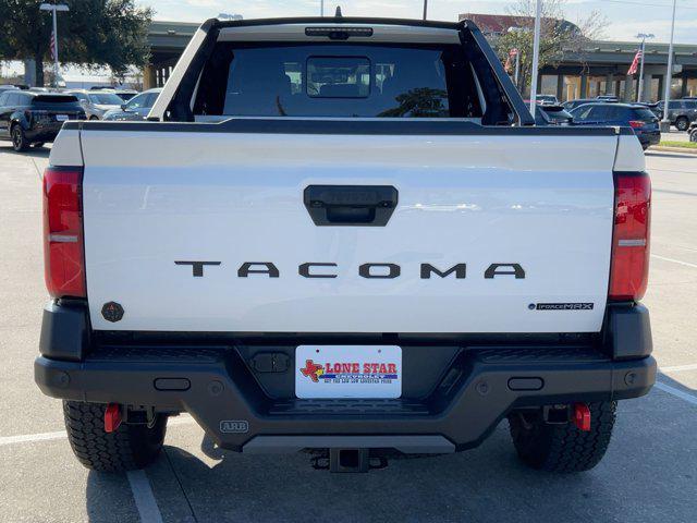 used 2025 Toyota Tacoma Hybrid car, priced at $55,599