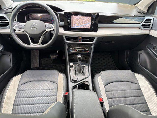 used 2025 Volkswagen Taos car, priced at $29,463