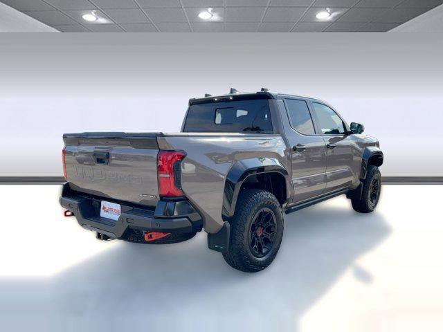 used 2025 Toyota Tacoma Hybrid car, priced at $61,886