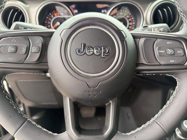 used 2023 Jeep Wrangler car, priced at $34,221