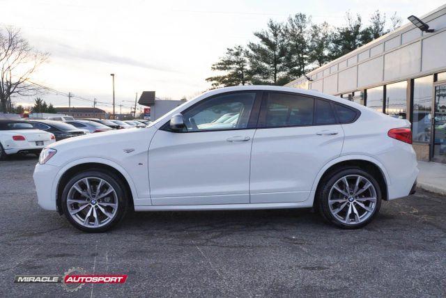 used 2016 BMW X4 car, priced at $23,495
