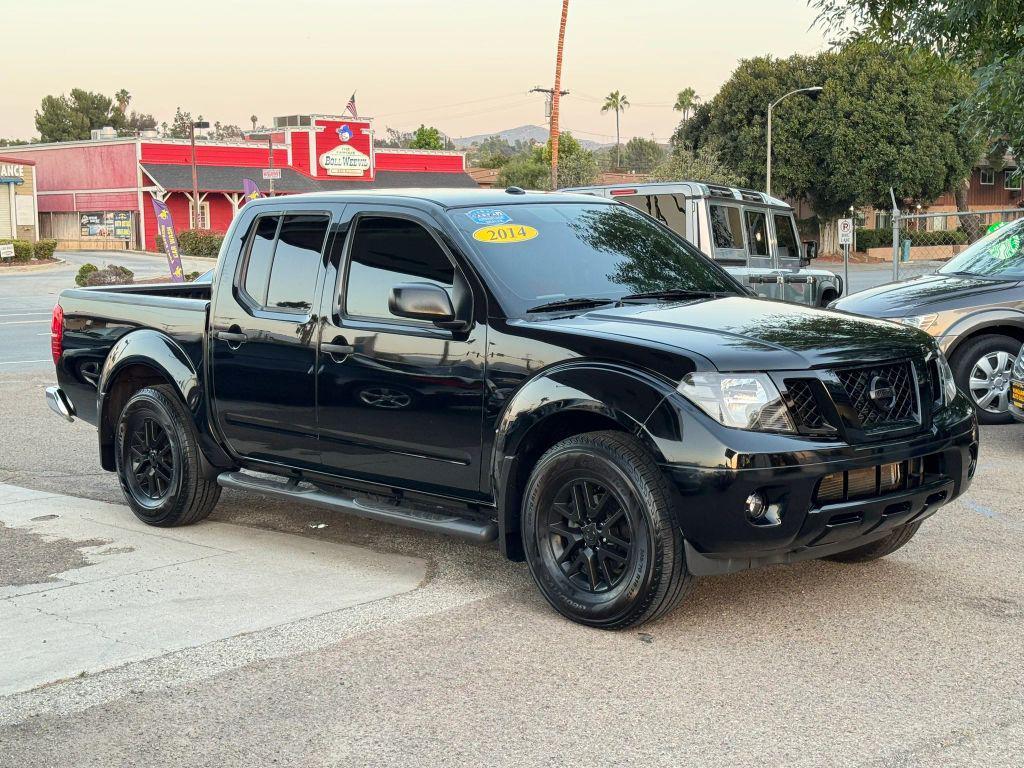 used 2014 Nissan Frontier car, priced at $13,995