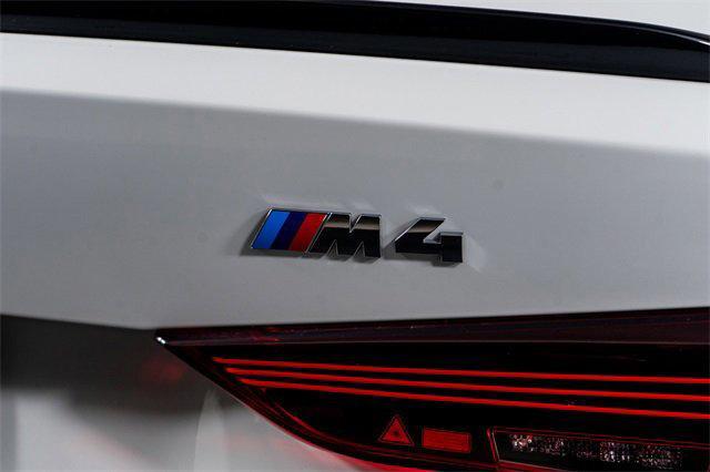 used 2025 BMW M4 car, priced at $76,698