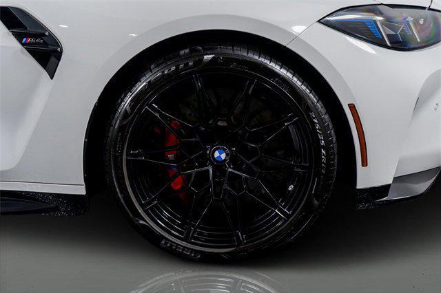 used 2025 BMW M4 car, priced at $76,698