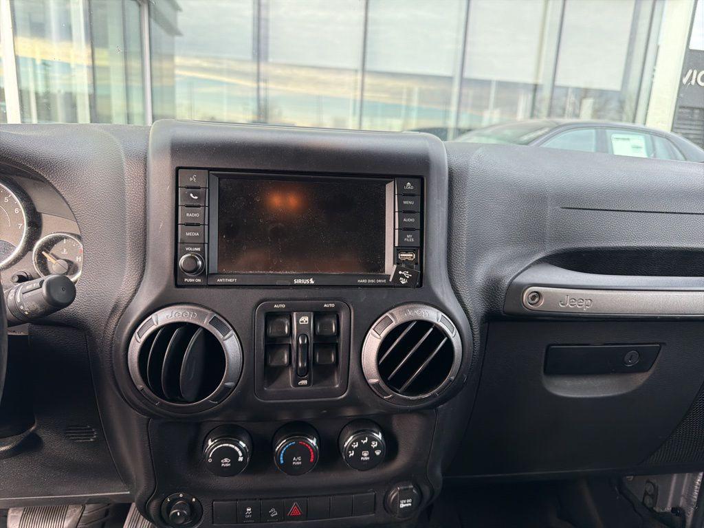 used 2015 Jeep Wrangler Unlimited car, priced at $14,994