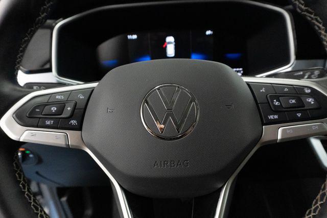 used 2025 Volkswagen Taos car, priced at $23,079