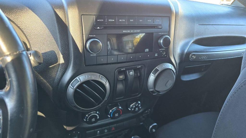 used 2015 Jeep Wrangler car, priced at $13,950