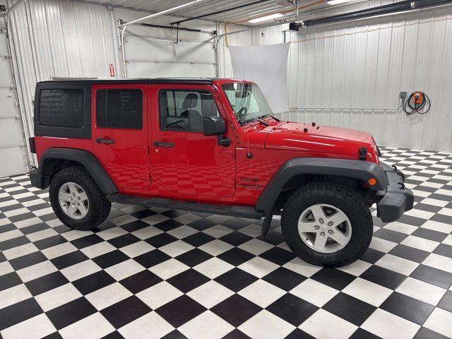 used 2015 Jeep Wrangler Unlimited car, priced at $16,697