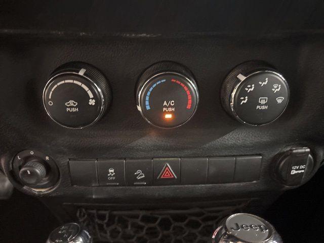 used 2015 Jeep Wrangler Unlimited car, priced at $16,697