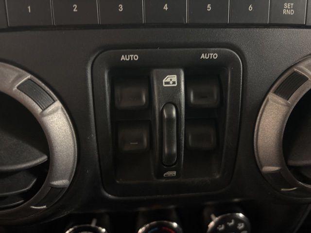 used 2015 Jeep Wrangler Unlimited car, priced at $16,697