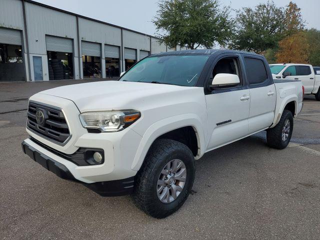 used 2019 Toyota Tacoma car, priced at $23,856