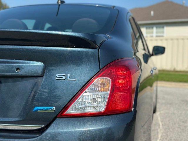 used 2015 Nissan Versa car, priced at $7,530