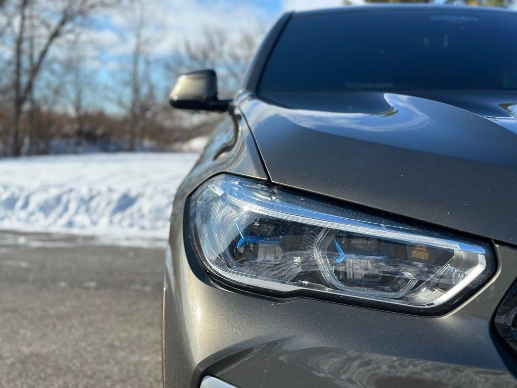 used 2022 BMW X6 car, priced at $38,880