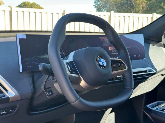 new 2026 BMW iX car, priced at $85,725