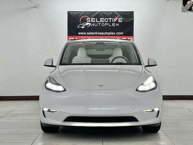 used 2023 Tesla Model Y car, priced at $28,996