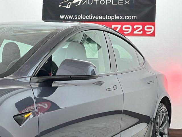 used 2023 Tesla Model 3 car, priced at $24,996