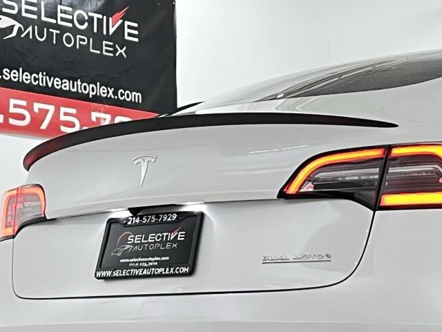 used 2023 Tesla Model 3 car, priced at $30,996