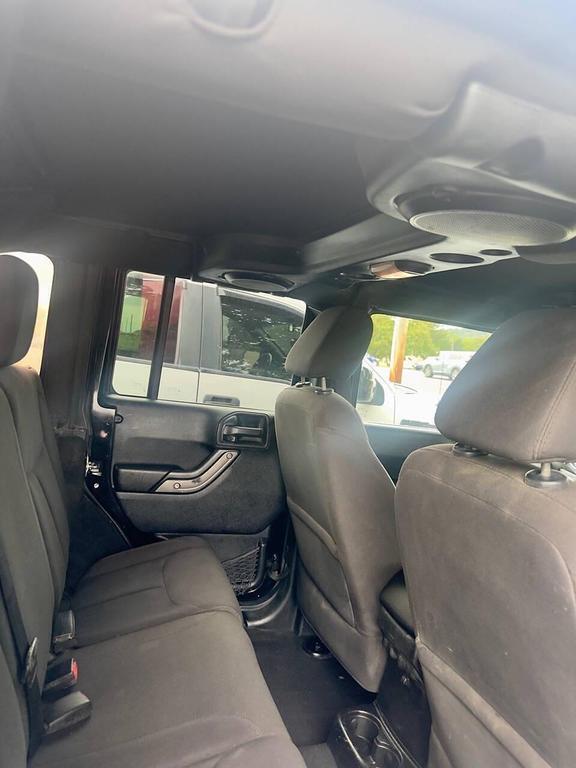 used 2014 Jeep Wrangler Unlimited car, priced at $8,900