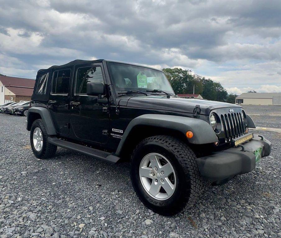 used 2014 Jeep Wrangler Unlimited car, priced at $8,900