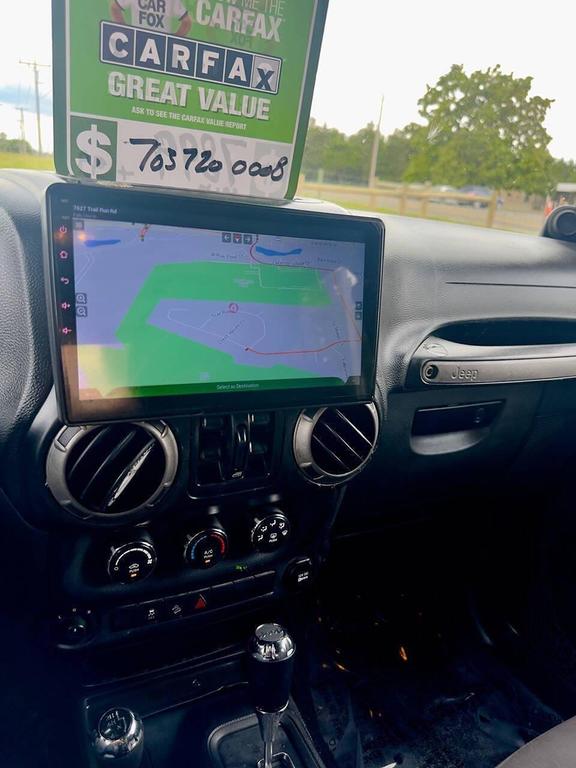 used 2014 Jeep Wrangler Unlimited car, priced at $8,900