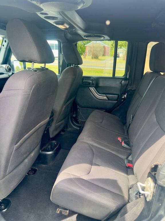 used 2014 Jeep Wrangler Unlimited car, priced at $8,900