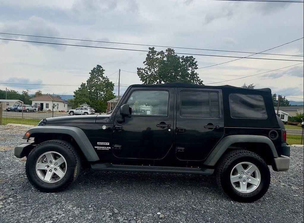 used 2014 Jeep Wrangler Unlimited car, priced at $8,900