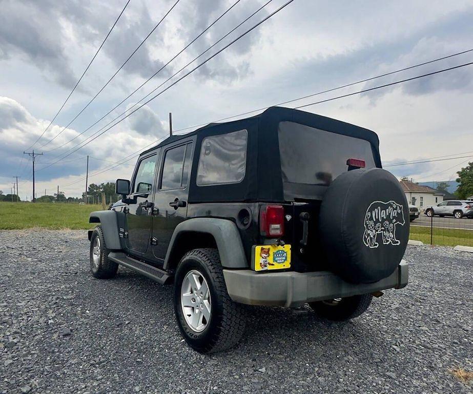 used 2014 Jeep Wrangler Unlimited car, priced at $8,900