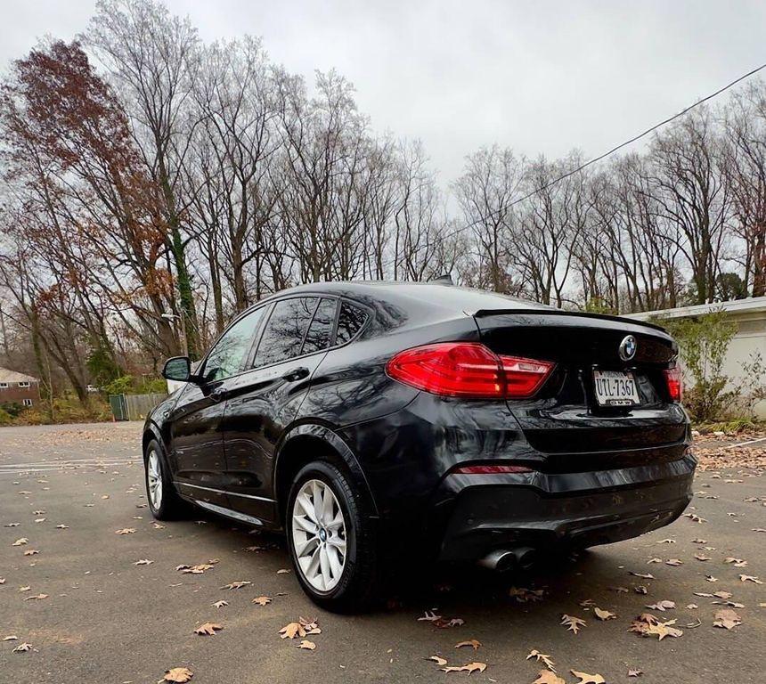 used 2015 BMW X4 car, priced at $10,900