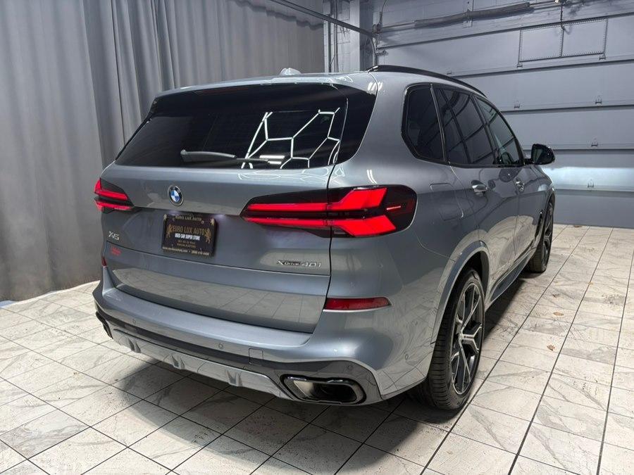 used 2024 BMW X5 car, priced at $57,884