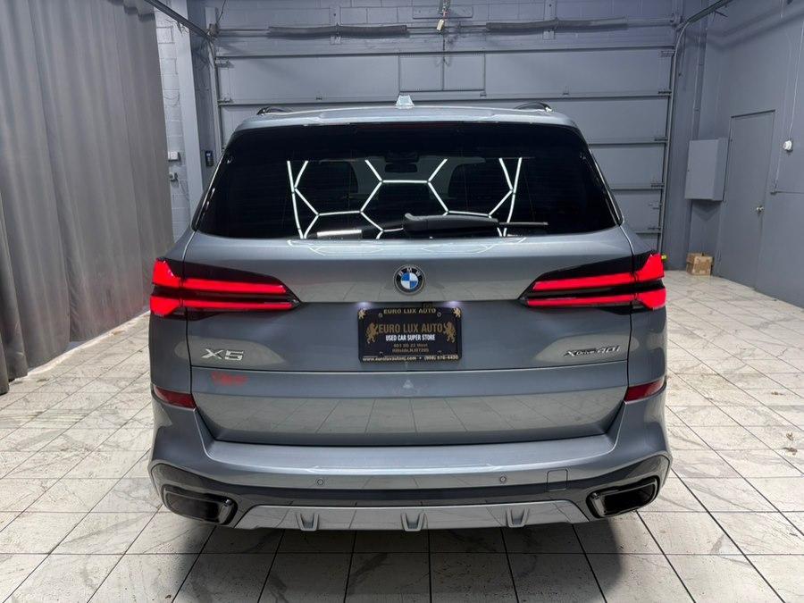 used 2024 BMW X5 car, priced at $57,884