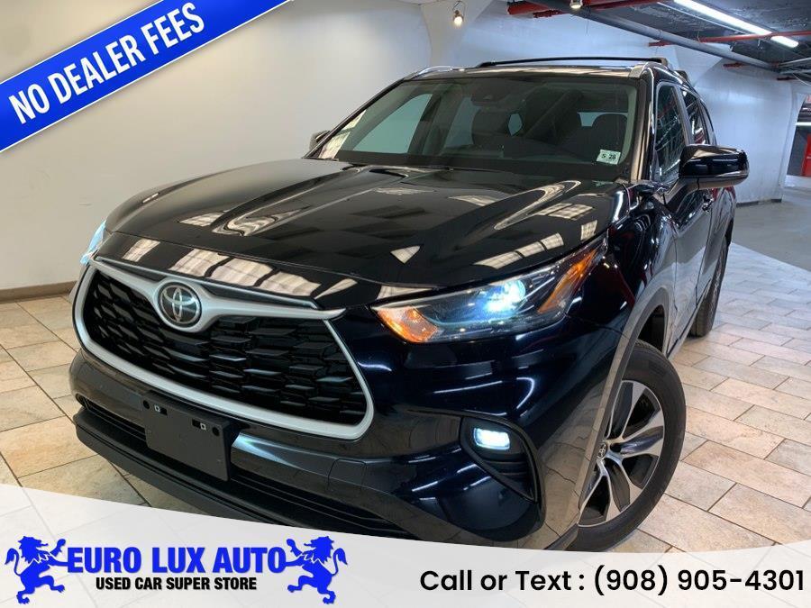 used 2023 Toyota Highlander car, priced at $37,884